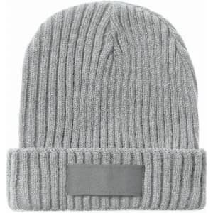 A grey beanie hat with a ribbed texture and a folded cuff, featuring a blank patch.
