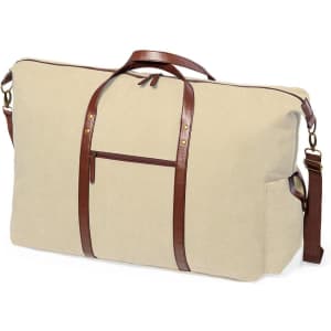A large beige travel bag with brown leather straps and detailing, featuring a front pocket and side handle.