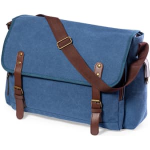 A blue messenger bag with a flap, featuring brown straps and a shoulder strap. It includes multiple compartments.