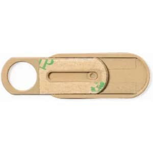 A beige product with a hole and a sliding mechanism, featuring an indent for easy handling. It has a simple, functional design.