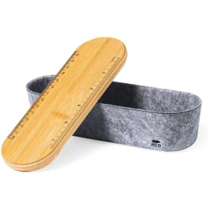 A bamboo lid and grey felt container, featuring a ruler along the edge of the lid.