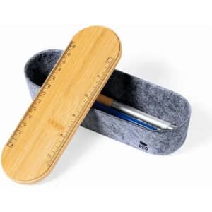 A pencil case with a bamboo lid and grey felt body, featuring a ruler etched on the lid.