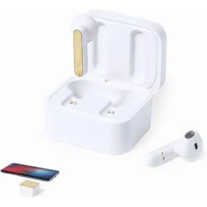 A pair of white wireless earbuds with a gold accent, resting in a white charging case alongside a small device.