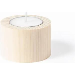 A candle in a round wooden holder with a smooth, light wood finish. The candle sits at the centre, unlit.