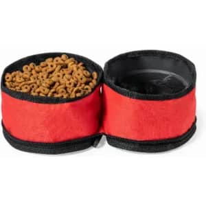 A dual-compartment container with a red exterior, one side holding dry snacks and the other empty, featuring a black trim.