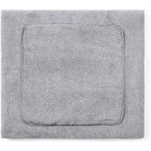A grey bath towel with a square design and a soft texture, featuring a bordered edge.