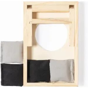 A wooden frame with a circular cutout, featuring grey and black fabric cushions attached.