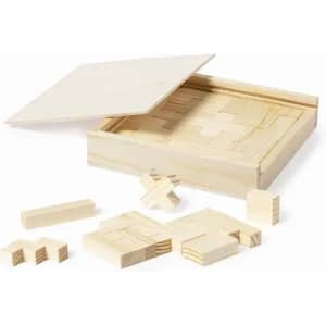 A wooden puzzle set with various shaped pieces, displayed alongside its open box. The wood has a light natural finish.