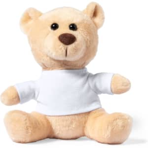 A plush teddy bear in tan fur, featuring black eyes and a brown nose, dressed in a plain white shirt.