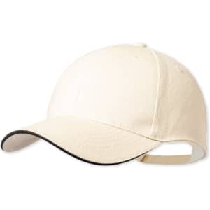 A beige cap with a black peak and an adjustable strap at the back. It features branding on the front.