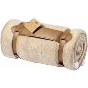 A rolled-up beige blanket secured with brown straps, featuring a tag attached.