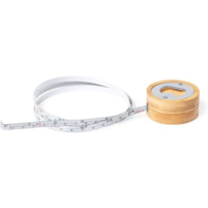 A measuring tape with a white body and a wooden spool, coiled next to it. The tape features standard measurements.