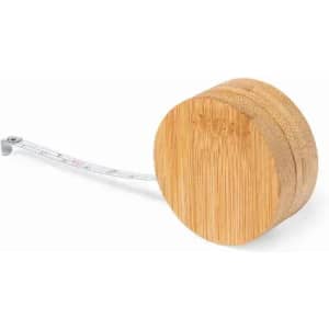 A measuring tape with a wooden round casing, featuring a retractable tape in a contrast colour.