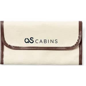 A cream-coloured pouch with a brown trim and a logo on the front. It features a flap closure.