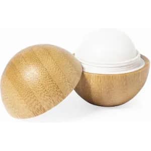 A bamboo container with a rounded lid, housing a white solid product inside. The wood has a natural texture.