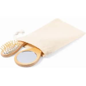 A wooden hairbrush and mirror set packaged in a cream-coloured pouch. The brush has wooden bristles.