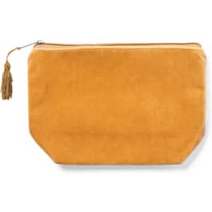 A pouch in a warm golden hue, featuring a zipper closure and a decorative tassel.