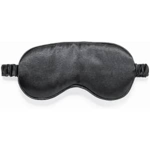A black sleep mask with an elastic band for a comfortable fit. It has a smooth surface and a simple design.