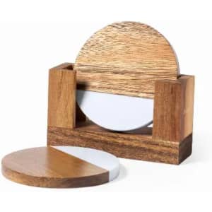 A wooden coaster set featuring a circular design with a contrasting white surface and a wooden base for display.