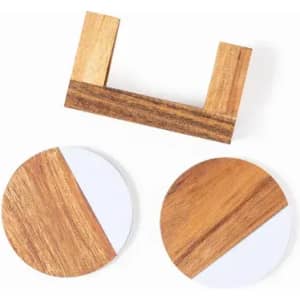 A set of wooden coasters featuring a natural wood finish and a white section, accompanied by a wooden holder.