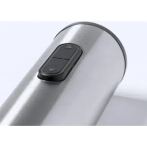 A drink bottle in silver stainless steel with a black control button on the side.