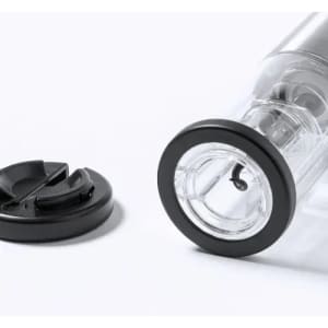 A drink bottle with a transparent body and black accents, featuring a removable lid and a built-in straw.