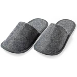 A pair of grey felt slippers with a soft, cushioned sole and open toe design. They feature a simple, classic style.