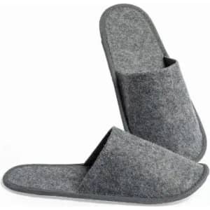 A pair of grey felt slippers with open toes and a plush texture. They have a simple design and soft soles.