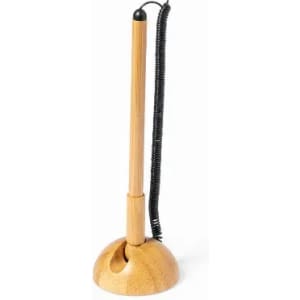 A wooden pen holder with a coiled wire and a slender pen standing upright. The base is rounded and smooth.