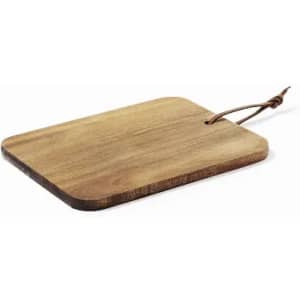 A wooden serving board with rounded edges and a leather strap for hanging. The surface has a natural finish.