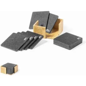 A set of grey coasters neatly arranged in a wooden holder. The coasters feature branding.