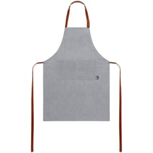 A grey apron with brown straps and a small logo at the front. It features a practical design with no embellishments.
