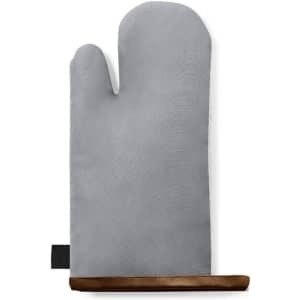 A grey oven mitt with a brown accent at the base and a hanging loop for easy storage.