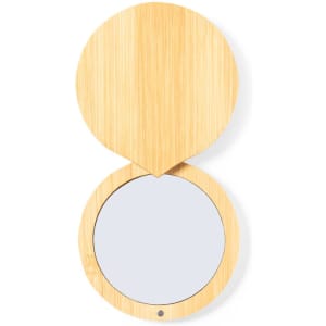 A compact mirror with a bamboo exterior, featuring a simple round mirror inside. It has a natural, light brown colour.