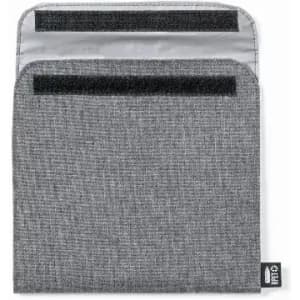 A grey sleeve with a textured fabric, featuring a velcro closure and branding label at the bottom.