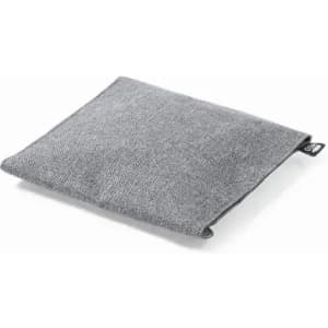 A grey square cushion with a textured fabric surface and a tag on one side.