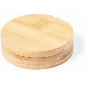A round bamboo coaster with a smooth surface, showcasing its natural light brown colour and wooden texture.