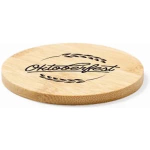 A bamboo serving board with a circular shape, featuring an engraved Oktoberfest design and decorative elements.