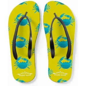 A pair of yellow flip-flops featuring blue crab patterns and black straps. The soles have a branding logo.