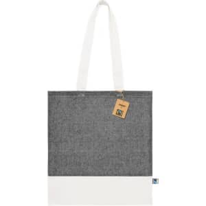A tote bag in grey and white features long handles and a tag, with a logo on the side.