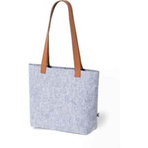 A tote bag made of grey felt with brown leather handles, featuring a simple and modern design. It has a branding tag.