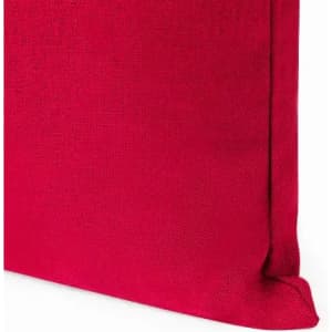 A cushion with a vibrant red fabric cover, featuring a neatly stitched edge and a textured surface.