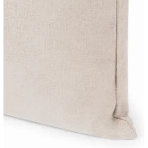 A cushion with a textured, light beige fabric covering, featuring clean edges and a simple design.