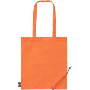 A reusable tote bag in bright orange with two long handles and a pouch for storage.