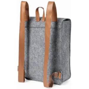 A grey fabric backpack with brown leather straps and a simple design featuring a logo.