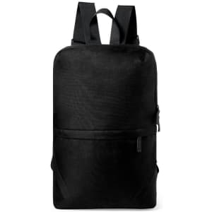 A black backpack featuring adjustable straps and a front zip pocket, with a minimalist design and logo.