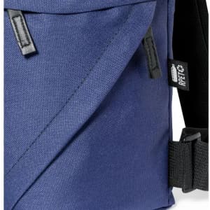 A blue fabric bag with a black strap and a small logo tag on the side.