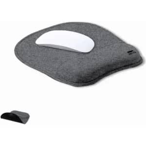 A wrist support with a grey fabric base and a white mouse pad section, featuring a brand logo.