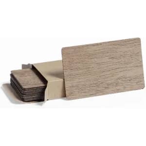 A set of wooden coasters in a package, featuring a natural wood grain finish. The coasters are rectangular in shape.