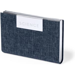 A notebook with a textured navy blue cover and a white rectangular section on the front, featuring branding.